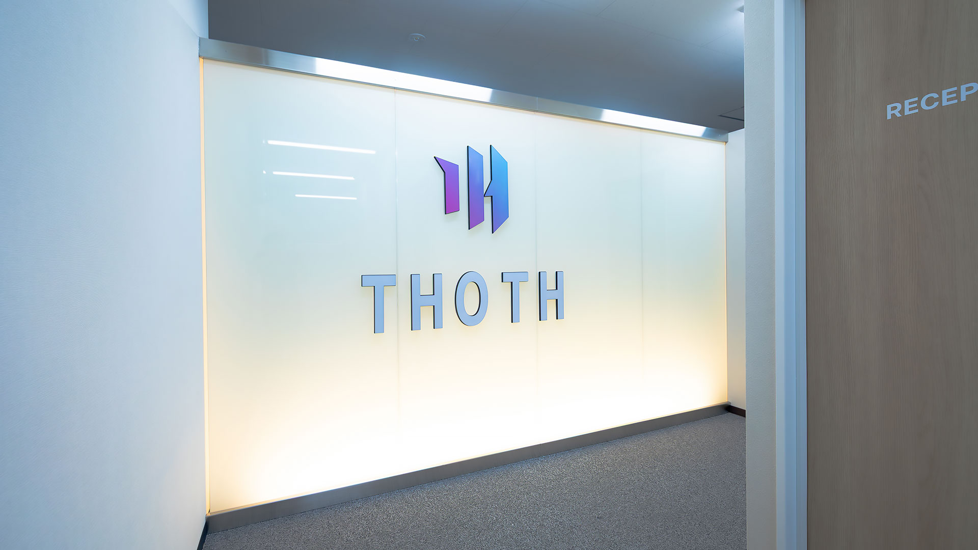 Thoth Pte.Ltd. 札幌オフィス（北海道）のオフィスエントランス・受付の内装施工写真｜施工：カエル・デザイン・プロジェクト株式会社